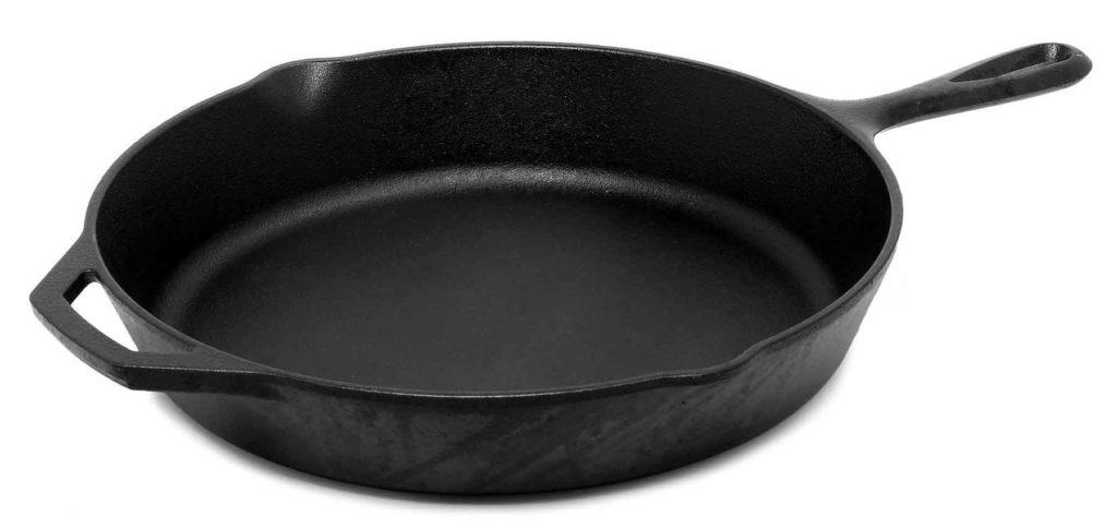 Brand new pre-seasoned cast iron pan ready for a gas stove